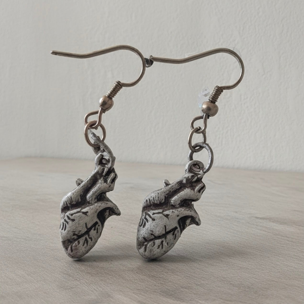 Silver Anatomical Heart Dangle Earrings